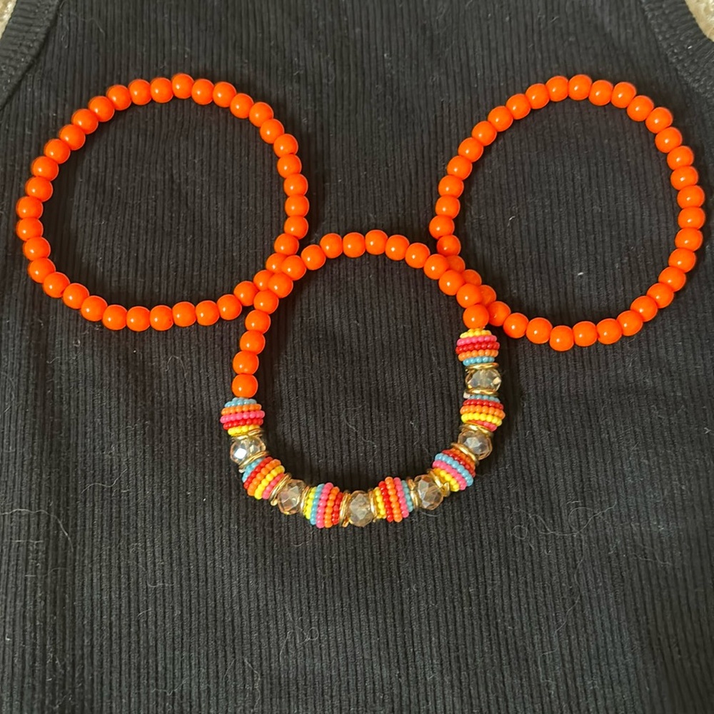 Set of 3 orange stretchy bracelet set from Brazil
